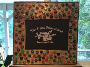 DIY man-cave art from old tshirt and bottlecaps