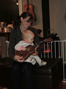 mom and baby playing ukulele