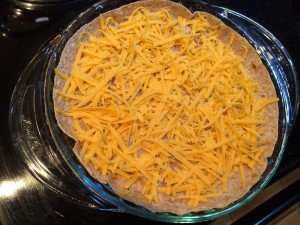 layer of cheese on tortilla