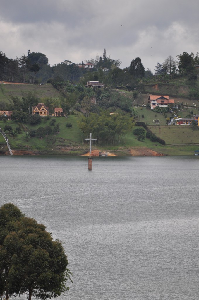 church cross in lake at guatape colombia medellin