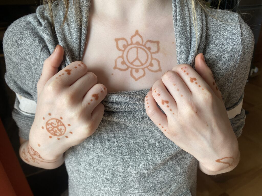 henna tatoos on chest